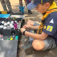 DC motor being turned with Solar Electricity, being connected to the panels. 
