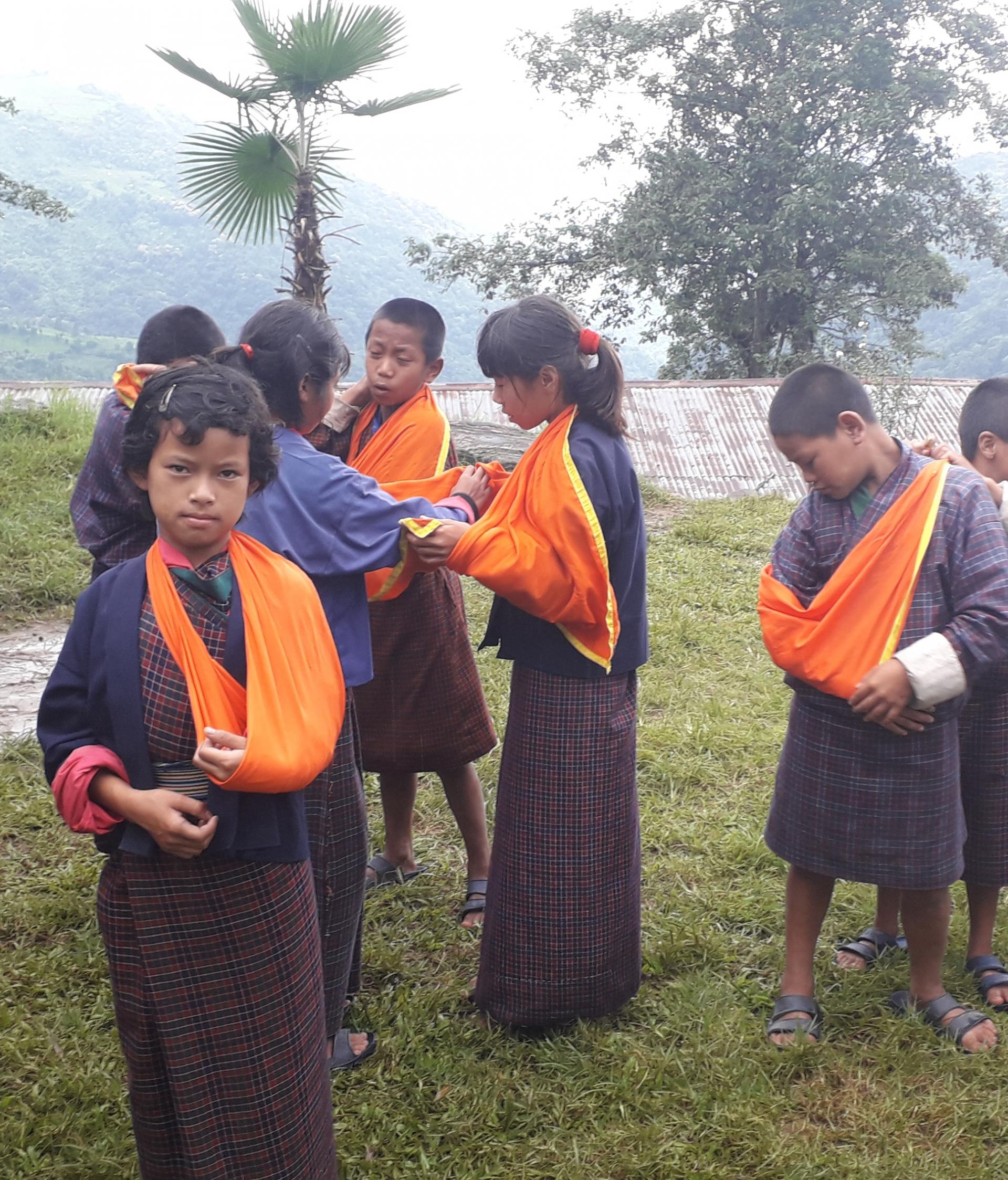  Teaching First Aid using Scout Scarf World Scouting