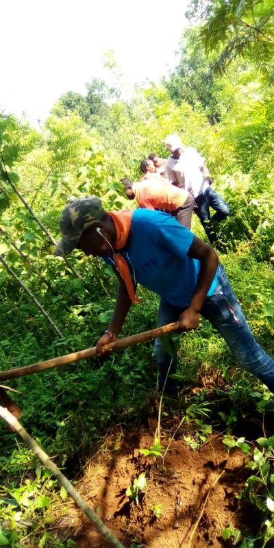 Kisii university Flamingo rover scouts in a work camp in Nyosia farm 