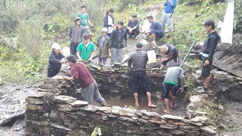 constructing water pond for Bamre monestery