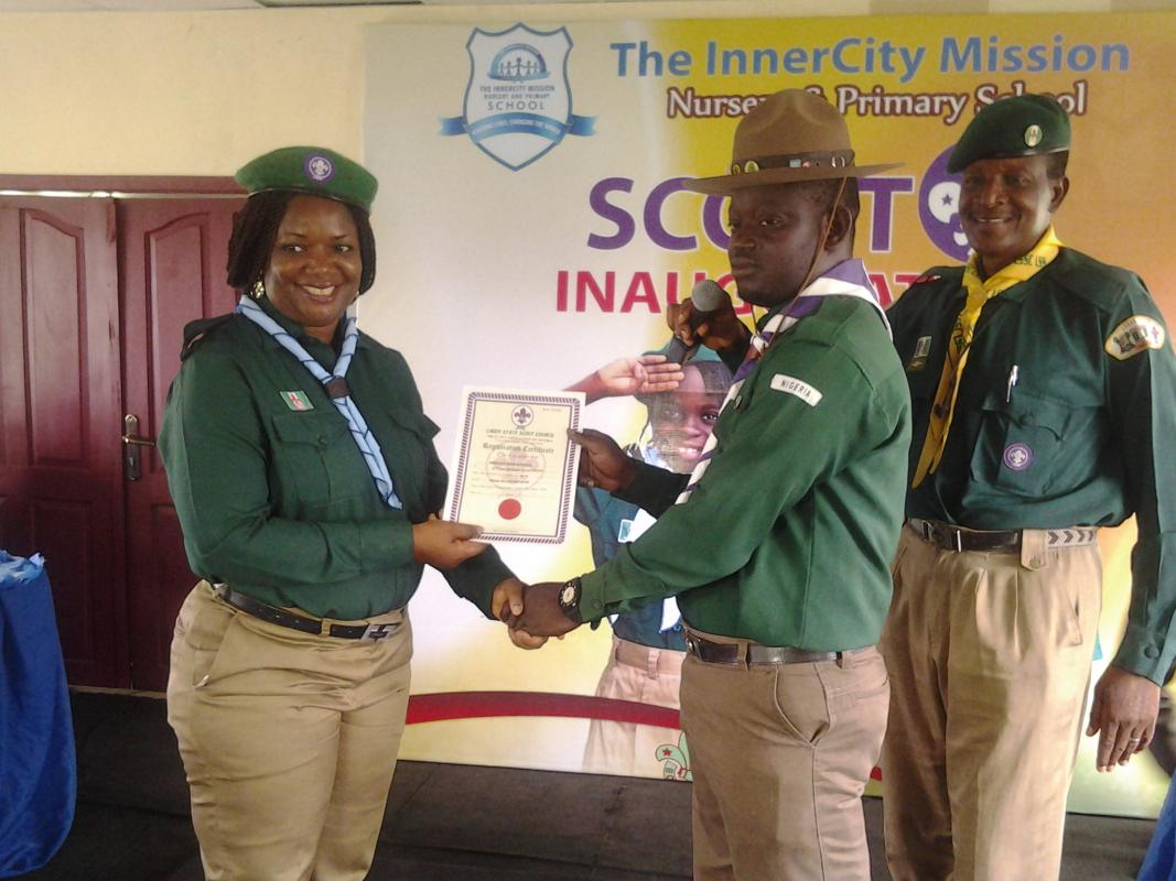 INVESTITURE OF LESS PRIVILEGE CUBS AND SCOUT BY PASTOR CHRIS OYAKILOME AS HE DONATES 50 CUBS AND SCOUT