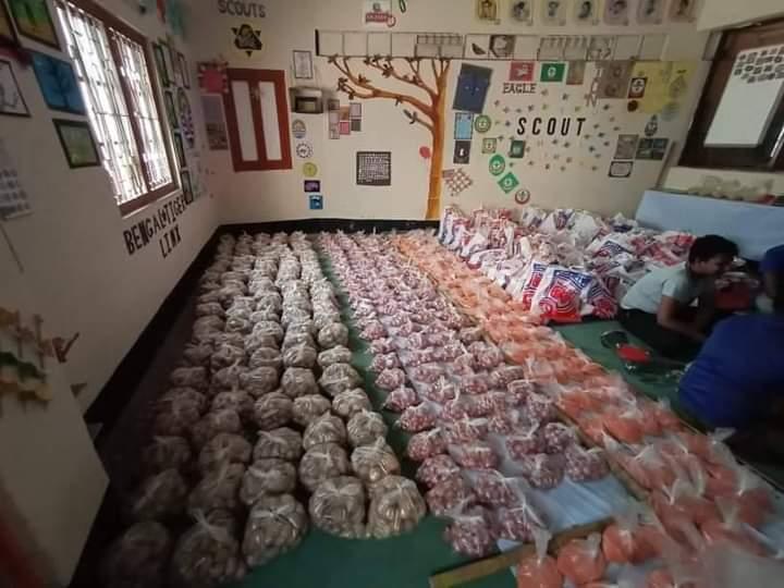 Distribution of food among the poor people