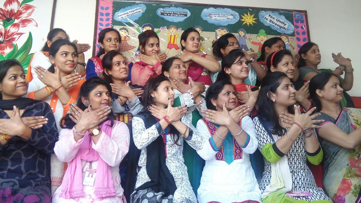 Teachers celebrate women's day with mop 
