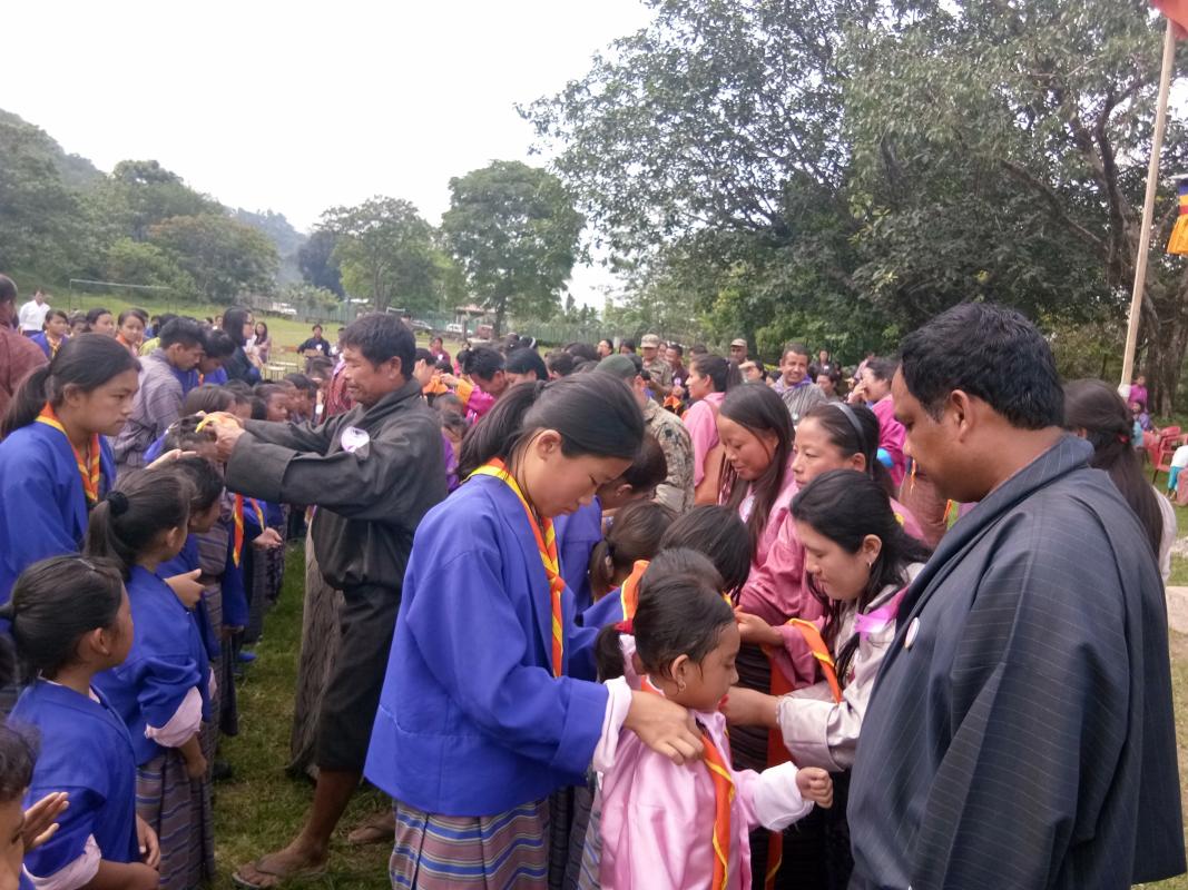 Investiture ceremony involving community