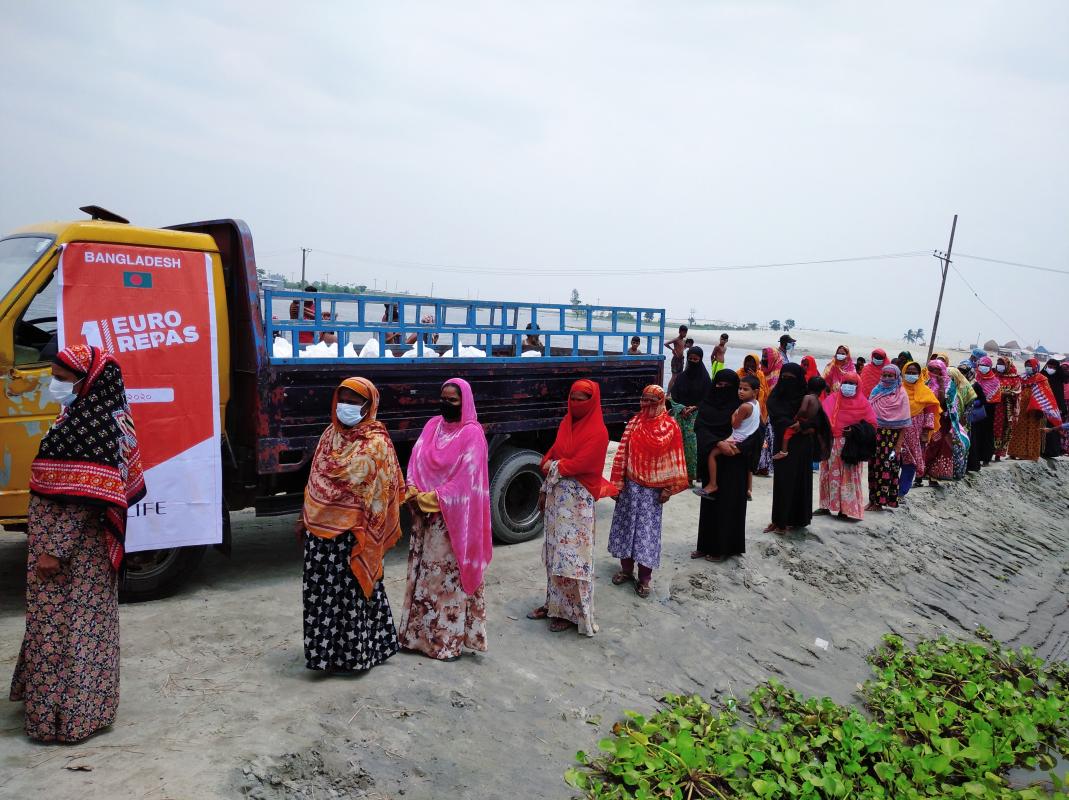 Eid items were distributed among the helpless and poor people.

