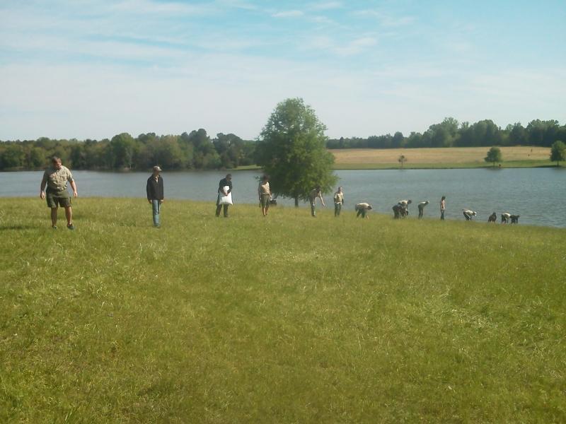 Boy Scouts clean up a park at a National Historic Site