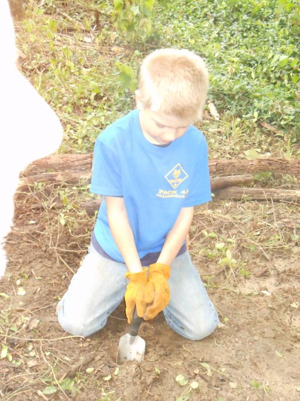 Children battling Invasive Vine Infestation(I.V.I.) in the children's garden