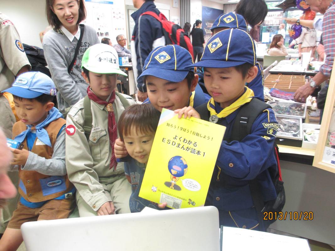 Scouts serve and show support as members of the local international community