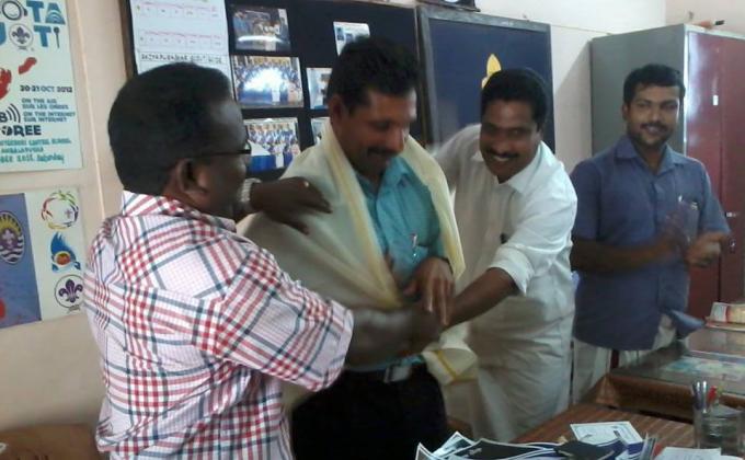 Honoring the District Association Secretary D. Harish for his achievement of Doctorate in Philosophy from Mahathma Gandhi University