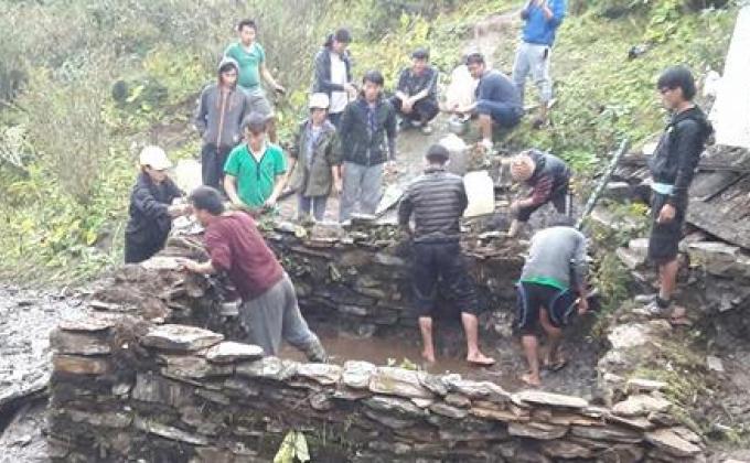 constructing water pond for Bamre monestery