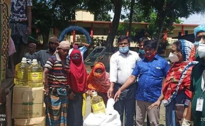 Distribution of food items among helpless distressed families


