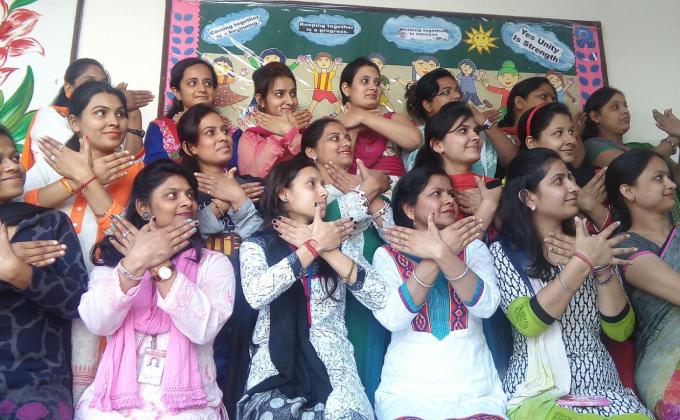 Teachers celebrate women's day with mop
