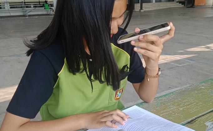 อ่านหนังสือให้คนที่พิการทางสายตา
