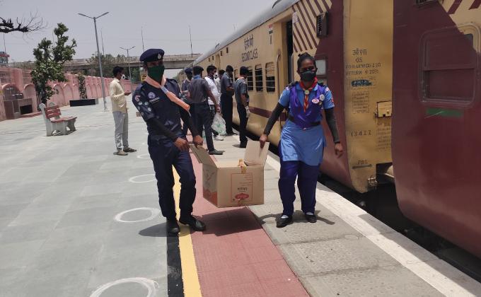 FOOD DISTRIBUTION AT RAILWAY STATION