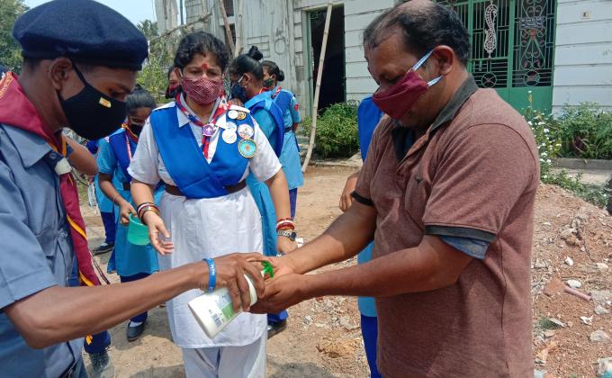 handwash and mask distribution by rovers nd rangers, s. b. sc. h. s. School konisi Ganjam odisha. project continuing since a year since the pandemic covid19 has started
