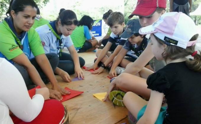 Teaching Kids Origami in AVISTAR KIDS in Campo Grande, MS, Brazil