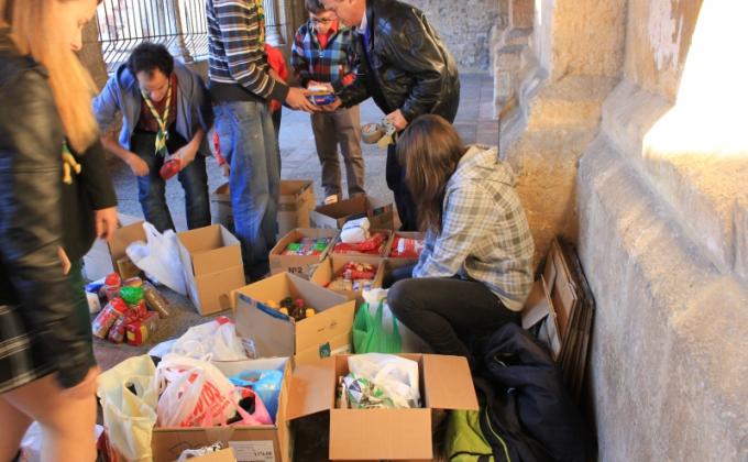 “Una llama de ilusión por un Kilo de esperanza”.