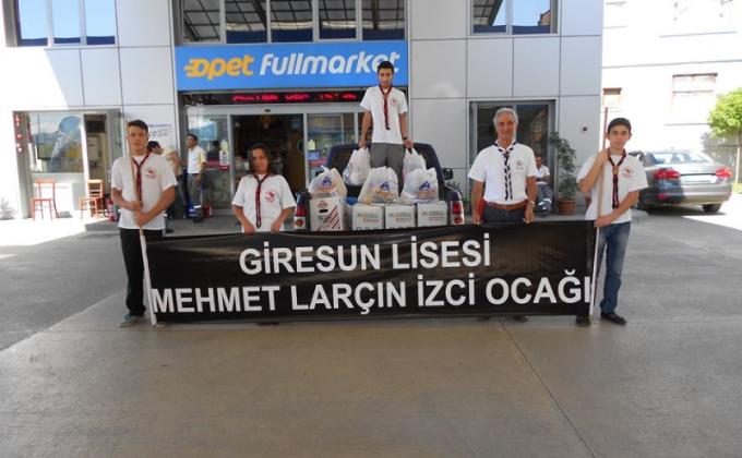 MEHMET LARCIN ROVER UNIT. DISTRIBUTION OF FOOD TO NEEDY