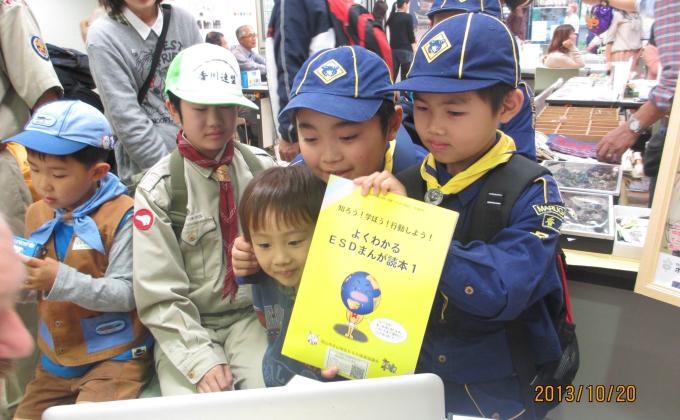 Scouts serve and show support as members of the local international community