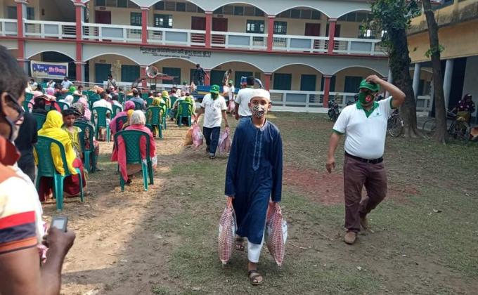 Distribution of new clothes and food