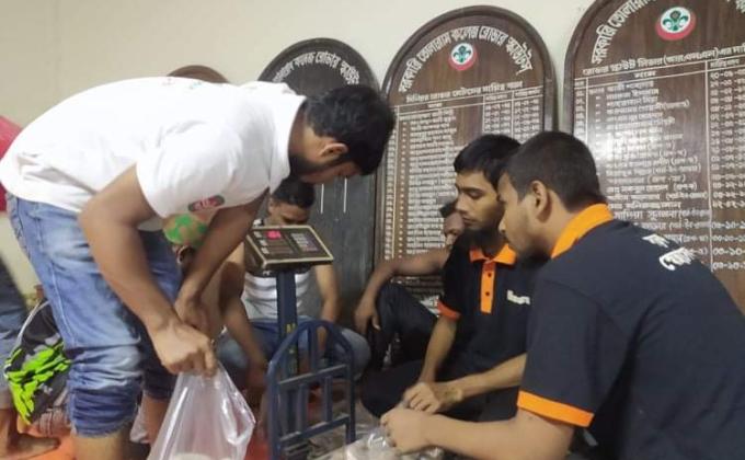 Packing relief materials for flood affected people.
